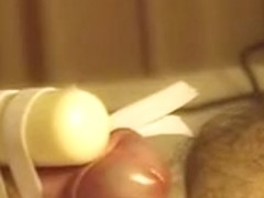 Close up of CD Cumming Hands Free with Vibrator