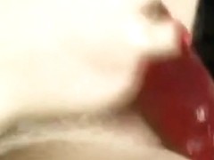 climaxing with a massive red sex-toy shlong