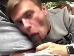 Deepthroating big uncut Russian cock in the car