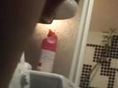 Girl pissed and slid tampon in cunt on voyeur spy video