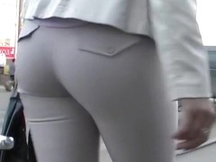 Booty in taut grey breeches