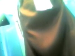 Pimpled ass of the pantyhose babe pissing on toilet