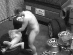 Guy packs babe in mouth and pussy on candid camera in the garage