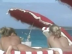 Beach voyeur movies present hot naked bodies basking in the sun.