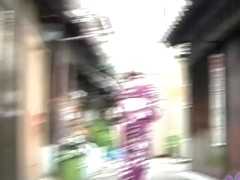 Jukata babe boob sharked while walking down the road.