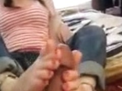Cute bubbly blonde putting her little feet to work