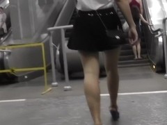 Blond gal legal age teenager up petticoat on escalator