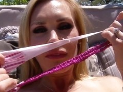 Cocky Tanya Tate masturbates while relaxing outside