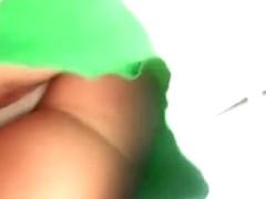 Tropical upskirt porn of a hot mama in a green tight dress showin ass n pus