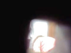 Dressing room spy cam spying fem through the wall hole