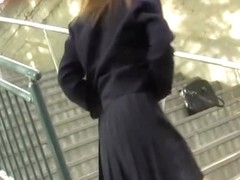 Japanese schoolgirl sharking on the staircase outdoors