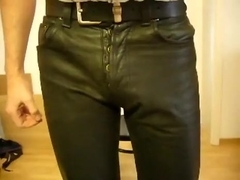 oily leather jeans