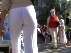 Street candid babe in white pants is looking great