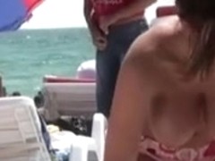 Amateur beach voyeur shows tits