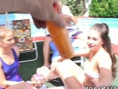 Foursome pool party with two teens