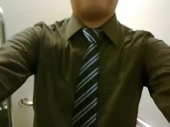 wank and cum in officewear at Singapore washroom