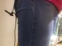 Nice fanny in blue jeans caught in a street candid clip