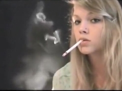 Beautiful blonde girl smoking her VS120s... Mika