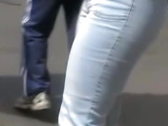 Candid sexy ass in tight jeans on the street