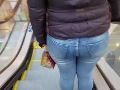 Hot and sexy big round ass in tight blue jeans