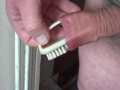 Nail brush in foreskin