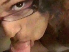 This Ebony has a seductive look on her face when she sucks dick