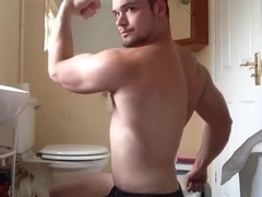 Muscle guy flexing   jerks off