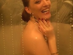 Beautiful chick loves to tease while showering