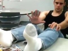 Justin shows US his feet at Work