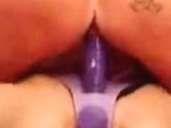 Lesbian couple has a frolicsome sex with purple strap-on