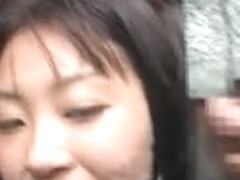 Japanese beauty gets a bukkake in public