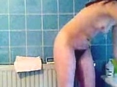 Voyeur camera caught a nice hairy pussy in the bathroom