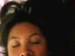 Asian wench lick black cock with her eyes closed