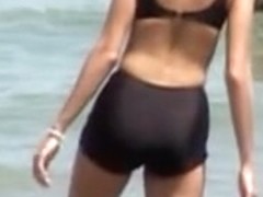 Black bikini candid voyeur girl on the crowded beach 07a