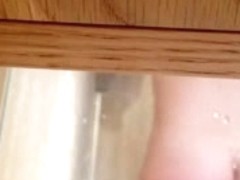 Hidden cam under shelf