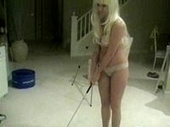 Maid on knees sucking rod