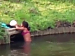 Chubby Brazilian chick takes a quick swim in the local river
