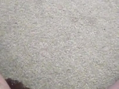 Pissing deep into the carpet while sitting