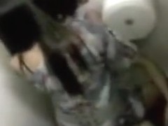 Brazilian coed riding penis in the toilet