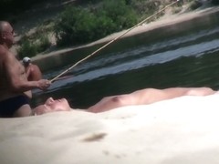 Hot nude blonde sunbathing filmed by hidden beach camera