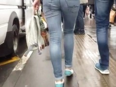 junior woman wriggle ass in tight jeans