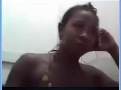 Black bitch showing wazoo on webcam