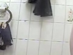 Housewife with hairy cunt caught on cam in wash room