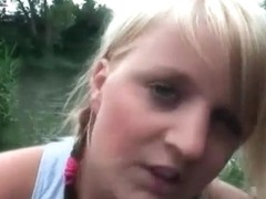 Gorgeous blonde rides dick on the river shore