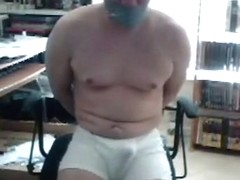 gagged with wide silver duct tape 1