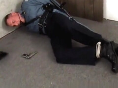 DILF trooper handcuffed gagged and struggling.