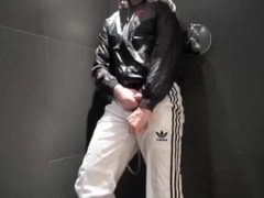 twink pissing in his Adidas tracksuit