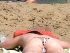 Topless beach brunette part1