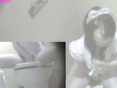 Hidden cam records teen getting orgasm in the toilet