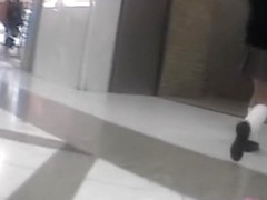 Hot Asian girl gets skirt sharked up in empty corridor